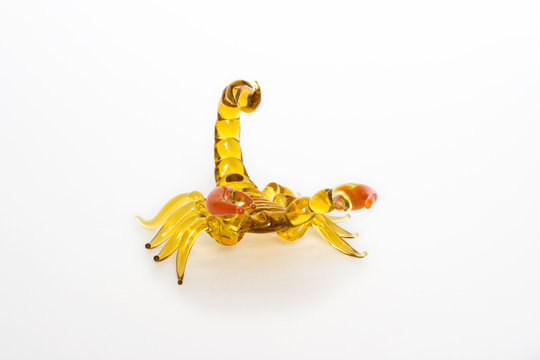 amber small statuette of a scorpion