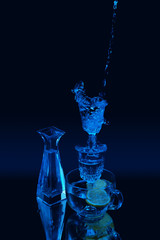 shot of water falling into a glass