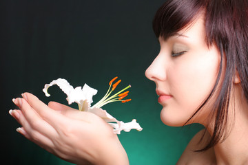 brunette with white lily flowers