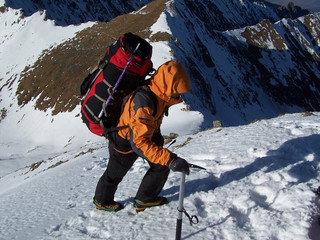 climber reaching the summit