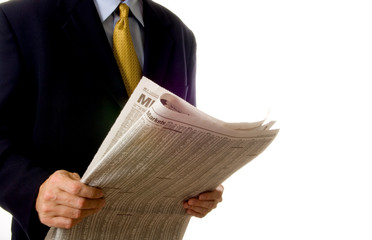 business man reading paper