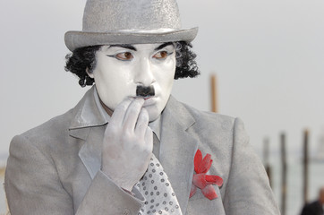 silver man wit read rose
