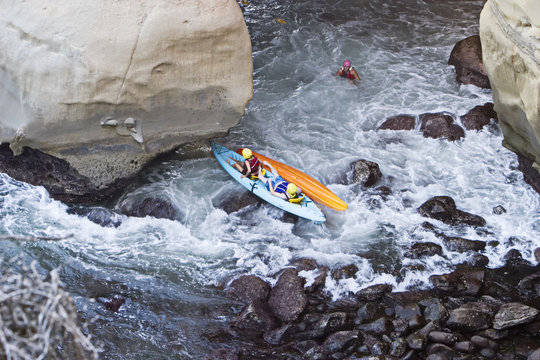 two kayaks in trouble
