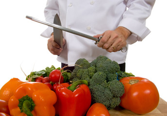 chef - man sharpening knife