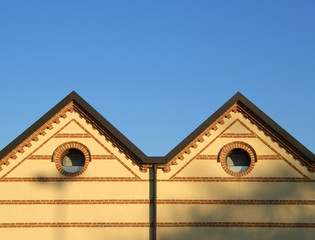 double hip roof and bricks