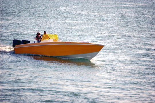 orange speed boat