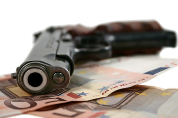 pistol and money