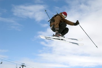 skier jumping high in the air