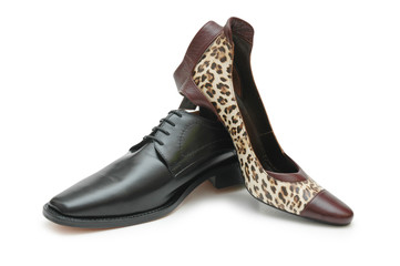 black male shoe and female shoe isolated on white