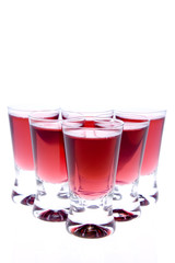 shot glasses of red vodka