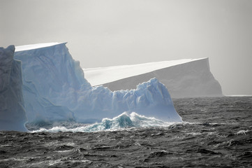 icebergs in rough waters