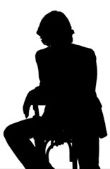 silhouette uomo sulla sedia