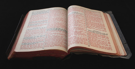 Obraz premium old bible with red text