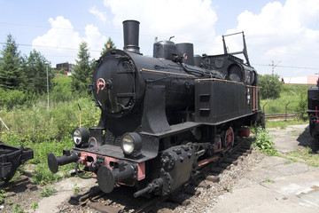 Plakat old steam engine at station