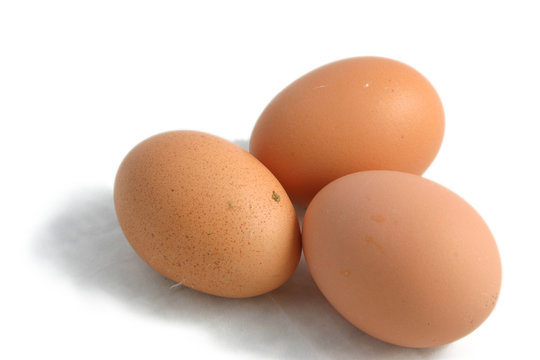 three hens eggs