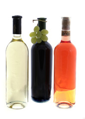 wine glasses with reflection of  wine bottles