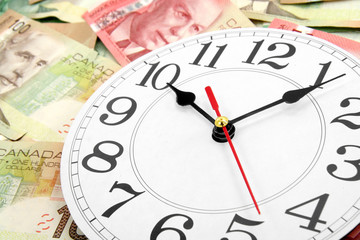 wall clock and canadian dollars