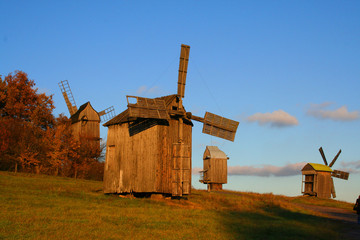 windmill at autumn landscape