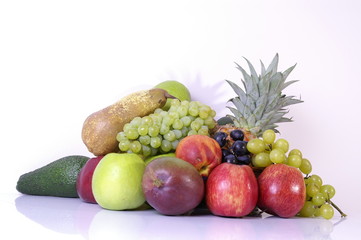 assorted fruit against a white background
