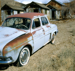 old rusty renault dauphine in  ghost town