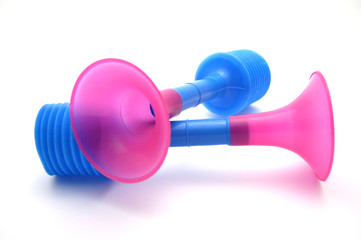 two pink/blue toyhorns