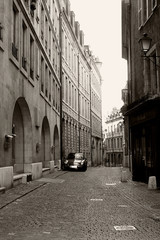 Naklejka premium Lonely car parked on the street