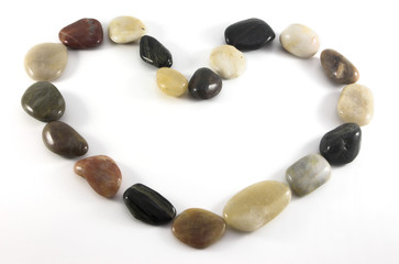heart symbol in pebbles