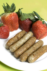 pork sausage links with strawberries