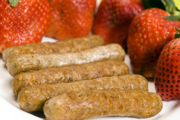 pork sausage links with strawberries