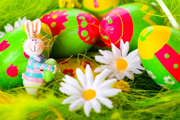 easter bunny and colorful painted eggs
