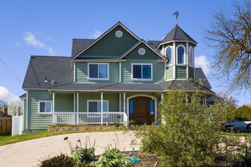 green victorian home
