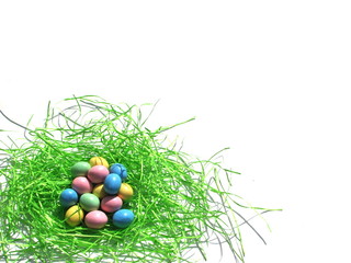 colored easter eggs in grass