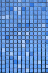 vertical view of small blue tiles.