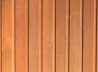 stained wood wall background.