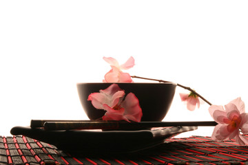 chinese sticks, plate and cup