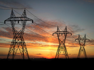 electric powerlines over sunrise