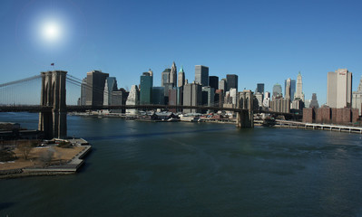 Fototapeta na wymiar słońce nad Manhattanem