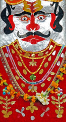 india, chittorgarh: painted statue