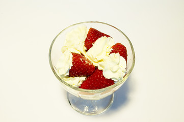 strawberries whipcream in glass