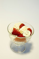 strawberries whipcream in glass