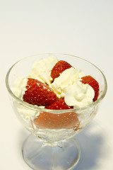 strawberries whipcream in glass