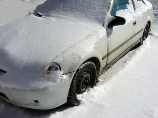snow covered car