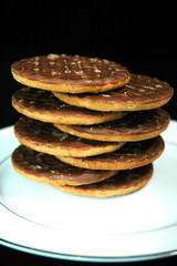 chocolate biscuits pile on plate