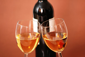 two wine glasses and bottle of wine