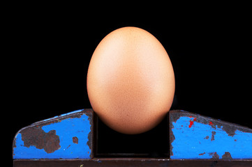 brownish egg made of felt