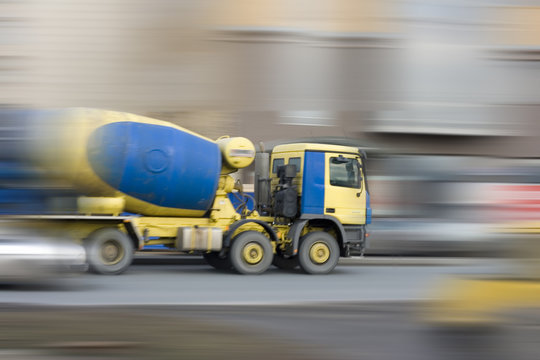 concrete mixer car rushing fast