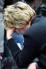 blonde woman is praying