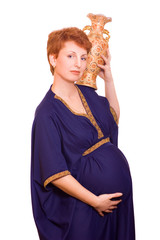 beautiful pregnant woman witha a vase