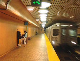 train arriving in subway
