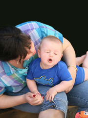 mother playing with her baby